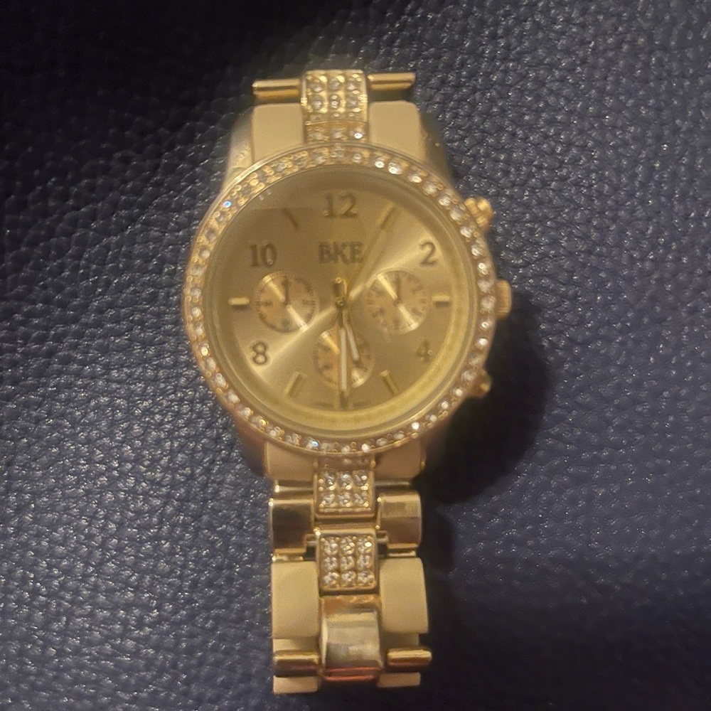 Gold buckle watch